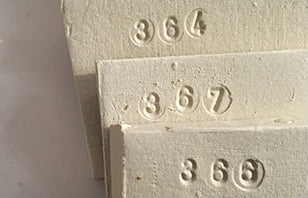 Commemorative Plaques (ceramic tile) in the Sacred Garden at MIC Baggot Street.