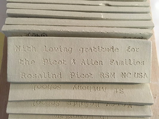 Commemorative Plaques (ceramic tile) in the Sacred Garden at MIC Baggot Street.